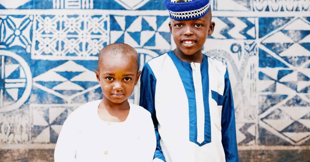 Two Bamum brothers posing for a photograph in Foumban.