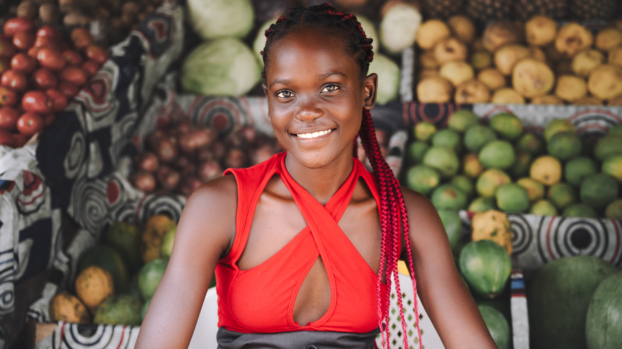 Portrait of a young African lady selling fruits in Douala, Cameroon.